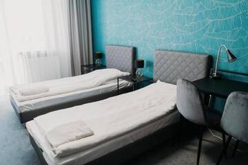 Фото номера Двухместный номер с 2 отдельными кроватями Отель Hotel Kinga г. Жарки-Летниско 3