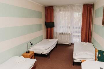 Фото номера Трехместный номер Отель Hotel Kinga г. Жарки-Летниско 2